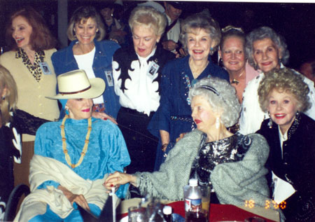 Here’to the ladies! (Back Row L-R) Mary Ellen Kay, Roberta Shore, Lyn Thomas, Ruth Terry, Unknown, Peggy Stewart. (Seated) Jane Russell, Dale Evans, Sue Ane Langdon.