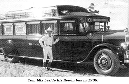 Tom Mix beside his live-in bus in 1936.
