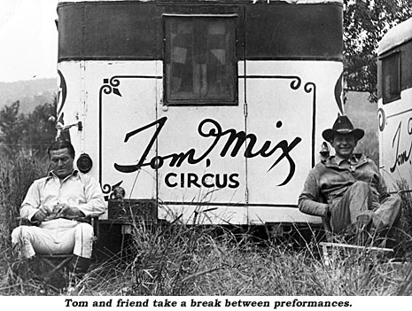 Tom and a friend take a break between performances.