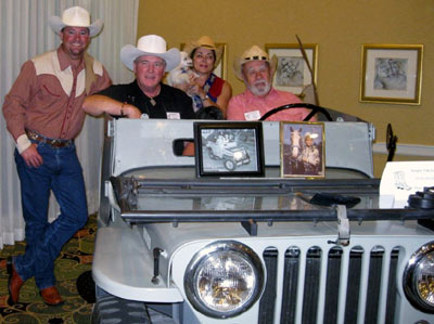 Roy Rogers’ grandson Dusty Rogers, Roy’s son Roy “Dusty” Rogers Jr., current Nellybelle owners Pam Weidel and John B. Haines pose in Pat Brady’s Jeep.