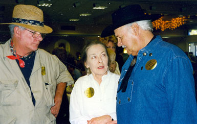 Screen badmen Tom Reese (L) and Chris Alcaide have a little menacing fun with B-Western leading lady Lois Hall at a Hollywood Collectors Show in October ‘97.