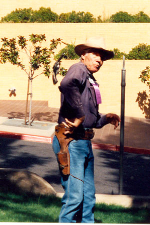 The fastest gun alive, Kelo Henderson of TV’s “26 Men”, performs some expert gun handling at the Toulumne County, Sonora, California, Wild West Film Fest in 1992.