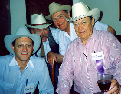 At the Toulumne County, Sonora, California, Wild West Film Fest in 1991, gun spinner and entertainer Mark Allen, director Bob Totten, Walter Reed and Ben Johnson.