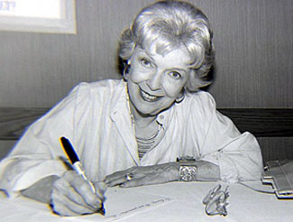 Verna Hillie looks up from autographing at the Memphis Film Festival in 1985. (Thanx to Grady Franklin.)