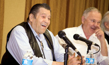 Clint Walker and festival co-sponsor and panel moderator Boyd Magers of WESTERN CLIPPINGS share a laugh during a panel discussion.