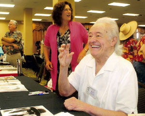 Henry Darrow, Manolito on “High Chaparral”, sold 110 copies of his autobiography HENRY DARROW: LIGHTNING IN THE BOTTLE. His co-author Jan Pippins stands beside him.