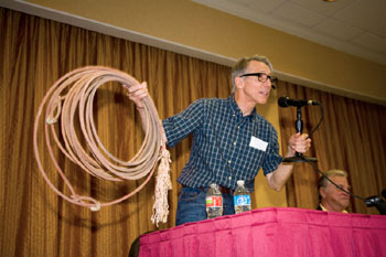 Johnny Crawford was enticed to show his roping abilities during a panel discussion.