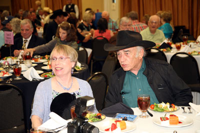 “The Virginian”, James Drury, chats with Donna Nielsen at the banquet. Bobby Clark and his wife Vikki Young are behind them as are radio recreation director Gary Yoggy and festival stalwart Harold Mathews.