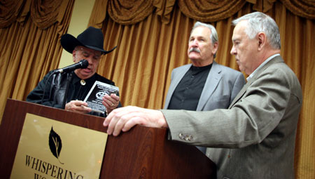 Packy Smith received an award from Ray and Boyd for beginning the Memphis Film Festival in 1972 when it was dedicated to B-western stars.