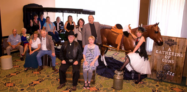 Here’s the staff that brought you “A Gathering of Guns 4”: (l-r in the Surrey) Felicity Bonello, Bea Quindlen, Donna Wilmeth, Mary Olsen, Donna Brisbin, Carol Ann Kellum, Packy Smith. (Front row l-r): Alex and Dottie McCollum, Donna and Boyd Magers, Ray and Donna Nielsen, Bonnie Boyd.