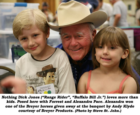 Nothing Dick Jones ("Range Rider", "Buffalo Bill Jr.") loves more than kids. Posed here with Forrest and Alexandra Pace. Alexandra won one of the Breyer horses given away at the banquet by Andy Klyde courtesy of Breyer Products.  (Photo by Steve St. John.)
