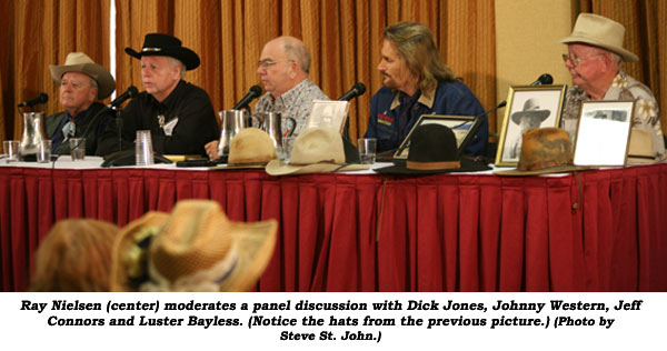 Ray Nielsen (center) moderates a panel discussion with Dick Jones, Johnny Western, Jeff Connors and Luster Bayless. (Notice the hats from the previous picture.)  (Photo by Steve St. John.)