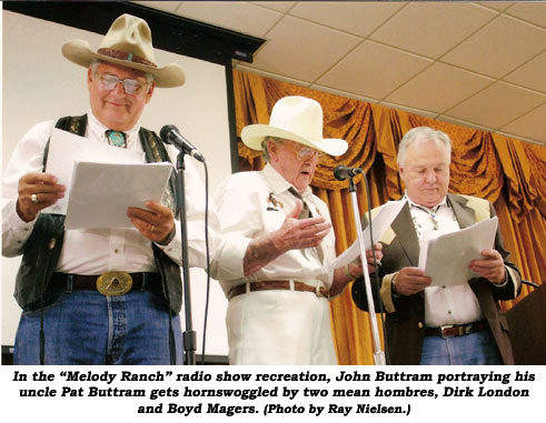 In the "Melody Ranch" radio show recreation, John Buttram portraying his uncle Pat Buttram gets hornswoggled by two mean hombres, Dirk London and Boyd Magers.  (Photo by Ray Nielsen.)