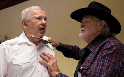 Gregg Palmer “threatens” Boyd Magers with the original machete Gregg meanced Ethan Wayne with in “Big Jake”. Magers obtained the machete from Palmer several years ago.