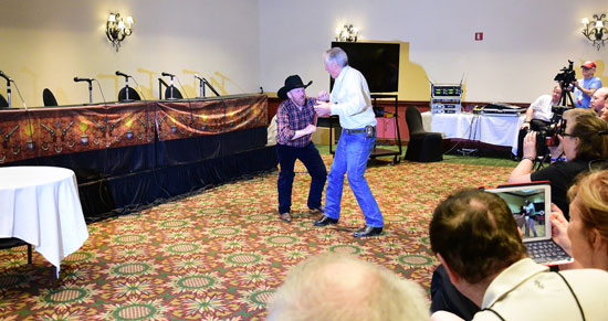 Bob Fuller and friend Tony Gill demonstrate the camera techniques in staging an onscreen stunt fight.