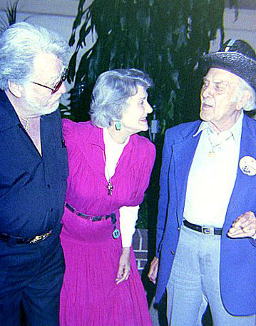 The King of the Bullwhip, Lash LaRue, Republic leading lady Peggy Stewart and perenial badman Terry Frost at the Portsmouth, OH, 1990 film festival. (Photo by Grady Franklin.)