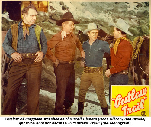 Outlaw Al Ferguson watches as the Trail Blazers (Hoot Gibson and Bob Steele) question another badman in "Outlaw Trail" ('44 Monogram).
