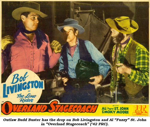 Outlaw Budd Buster has the drop on Bob Livingston and Al "Fuzzy" St. John in "Overland Stagecoach" ('42 PRC).