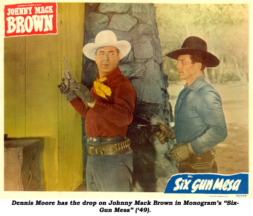 Dennis Moore has the drop on Johnny Mack Brown in Monogram's "Six-Gun Mesa" ('49).