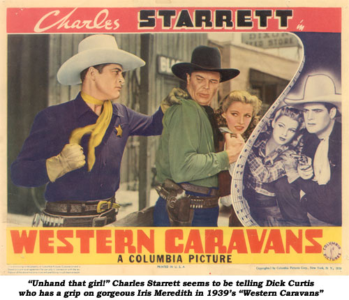 "Unhand that girl!" Charles Starrett seems to be telling Dick Curtis who has a grip on gorgeous Iris Meredith in 1939's "Western Caravans"
