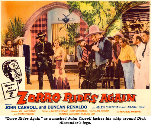 "Zorro Rides Again" as a masked John Carroll lashes his whip around Dick Alexander's legs.