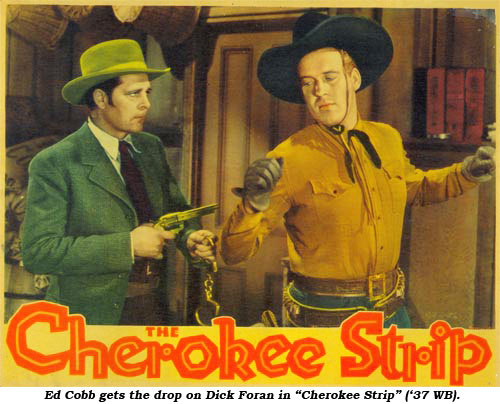 Ed Cobb gets the drop in Dick Foran in "Cherokee Strip" ('37 WB).