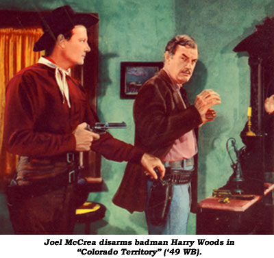 Joel McCrea disarms baman Harry Woods in "Colorado Territory" ('49 WB).