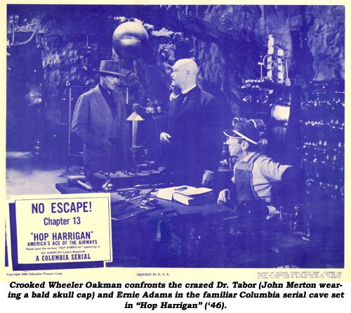 Crooked Wheeler Oakman confronts the crazed Dr. Tobar (John Merton wearing a bald skull cap) and Ernie Adams in the familiar Columbia serial cave set in "Hop Harrigan" ('46).