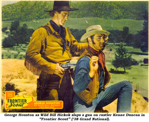 George Houston as Wild Bill Hickok slaps a gun on rustler Kenne Duncan in "Frontier Scout" ('38 Grand National).