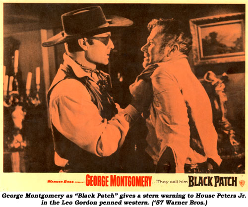George Montgomery as "Black Patch" gives a stern warning to Leo Gordon ('57 Warner Bros.).