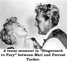 A tnese moment in "Stagecoach to Fury" between Mari and Forrest Tucker.