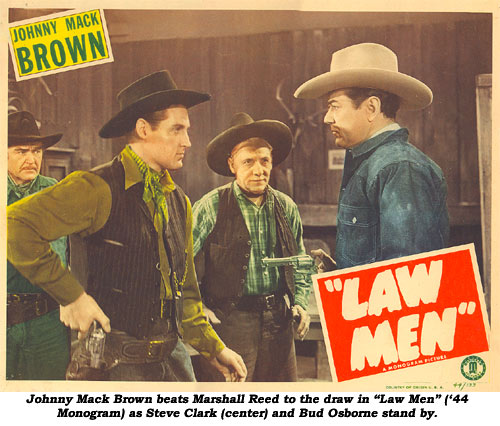 Johnny Mack Brown beats Marshall Reed to the draw in "Law Man" ('44 Monogram) as Steve Clark (center) and Bud Osborne stand by.