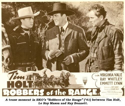 A tense moment in RKO's "Robbers of the Range" ('41) between Tim Holt, Le Roy Mason and Ray Bennett.