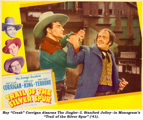 Ray "Crash" Corrigan disarms The Jingler--I. Stanford Jolley--in Monogram's "Trail of the Silver Spur" ('41).