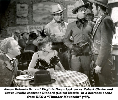 Jason Robards Sr. and Virginia Owen look on as Robert Clarke and Steve Brodie confront Richard (Chito) Martin in a barroom scene from RKO's "Thunder Mountain" ('47).