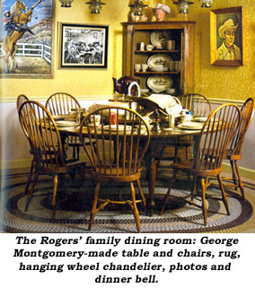 The Rogers family dinging room: George Montgomery-made table and chairs, rug, hanging wheel chandelier, photos and dinner bell.