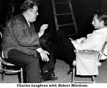 Charles Laughton with Robert Mitchum.