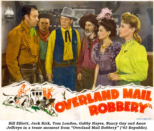Bill Elliott, Jack Kirk, Tom London, Gabby Hayes, Nancy Gay and Anne Jeffreys in a tense moment from "Overland Mail Robbery" ('43 Republic).