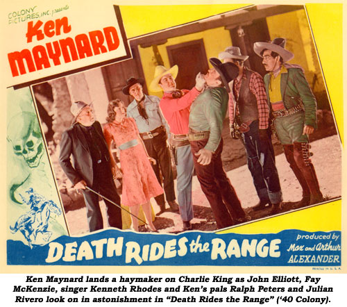 Ken Maynard lands a haymaker on Charlie King as John Elliott, Fay McKenzie, singer Kenneth Rhodes and Ken's pals Ralph Peters and Julian Rivero look on in astonishment in "Death Rides the Range" ('40 Colony).