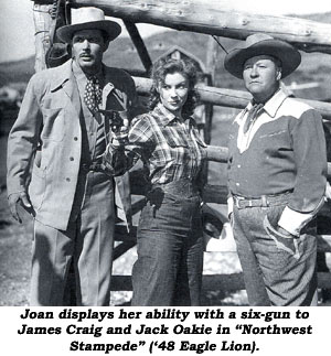 Joan displays her ability with a six-gun to James Craig and Jack Oakie in "Northwest Stampede" ('48 Eagle Lion).