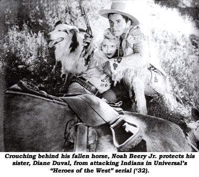 Crouching behind his fallen horse, Noah Beery Jr. protects his sister, Diane Duval, from attacking Indians in Universal's "Heroes of the West" serial ('32).