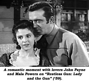 A romantic moment with lovers John Payne and Mala Powers on "Restless Gun: Lady and the Gun" ('59).