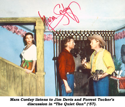 Mara Corday listens to Jim Davis and Forrest Tucker's discussion in "The Quiet Gun" ('57).