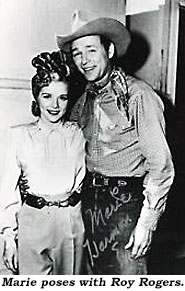 Marie poses with Roy Rogers.