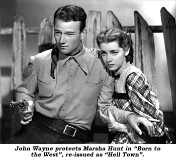 John Wayne protects Marsha Hunt in "Born to the Westa", re-issued as "Hell Town".