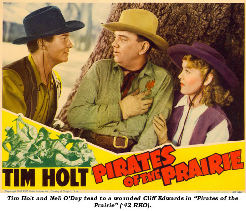 Tim Holt and Nell O'Day tend to a wounded Cliff Edwards in "Pirates of the Prairie" ('42 RKO).