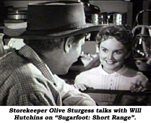 Storekeeper Olive Sturgess talks with Hutchins on "Sugarfoot: Short Range".
