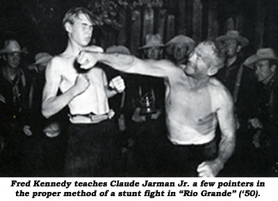 Fred kennedy teaches Claude Jarman Jr. a few pointers in the proper method of a stunt fight in "Rio Grande" ('50).