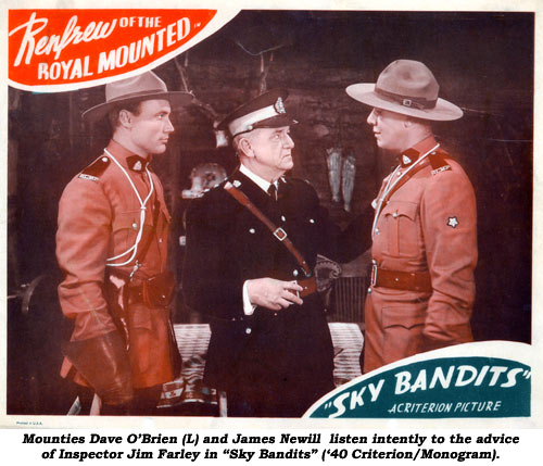 Mounties Dave O'Biren (L) and James Newill listen intentily to the advice of Inspector Jim Farley in "Sky Bandits" ('40 Criterion/Monogram).