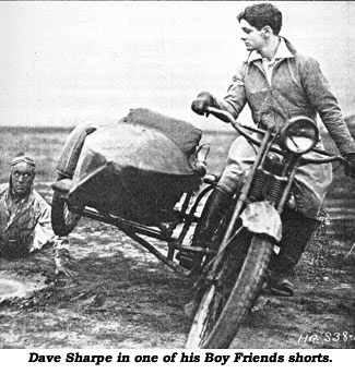 Dave Sharpe on motorcycle in one of his Boy Friends shorts.